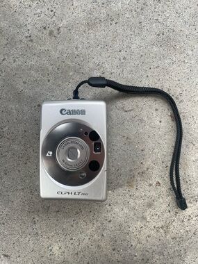 Canon Silver Compact Point-and-Shoot Camera with Wrist Strap